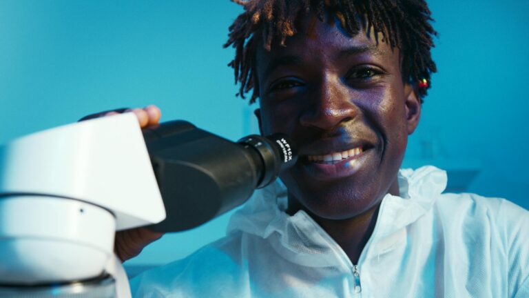 A Man Looking at the Camera While Smiling